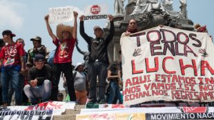 Migrantes centroamericanos repudian militarización de Trump en la frontera